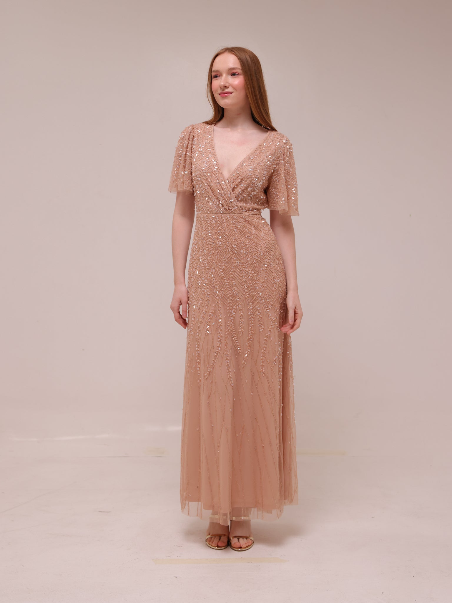 Champagne Sequin Flutter Sleeve Gown